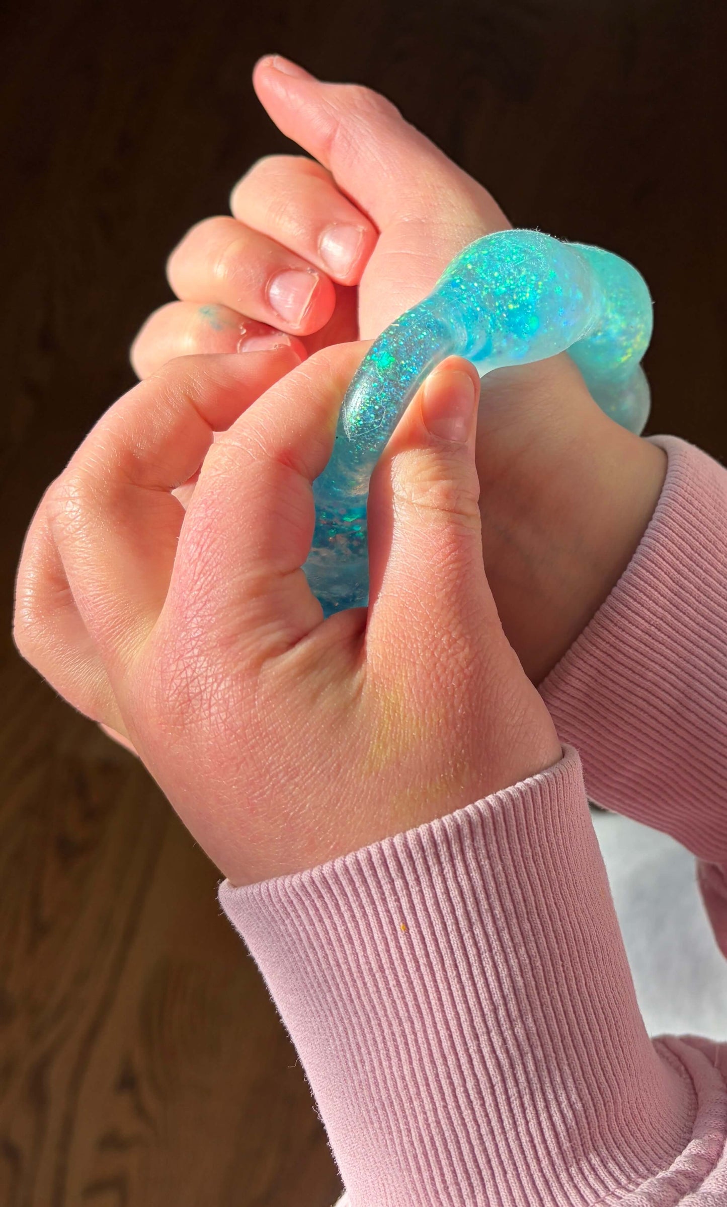 Feelzies™ Original Squishy Bracelet: Bubblegum Glow