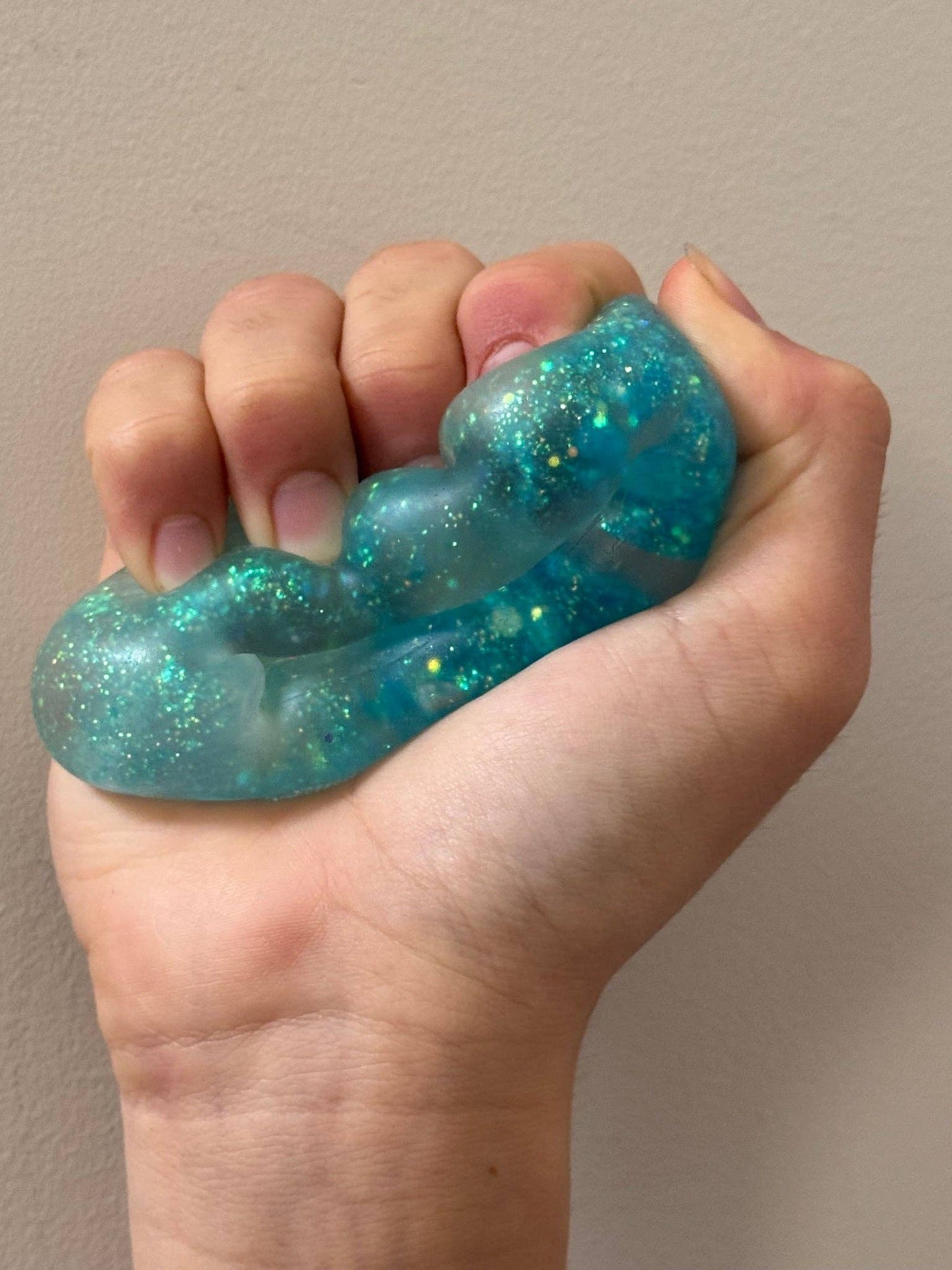Feelzies™ Original Squishy Bracelet: Bubblegum Glow