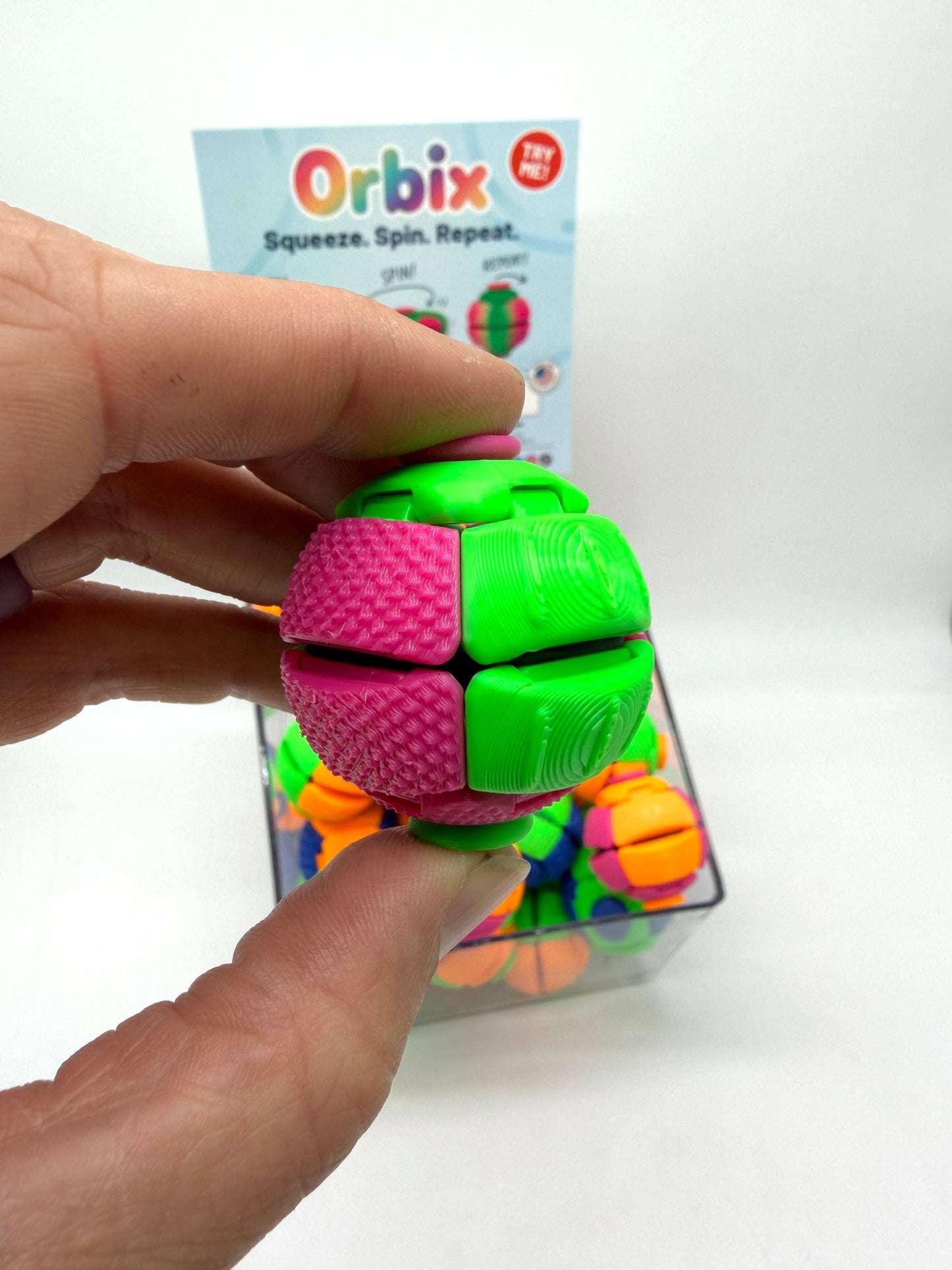 Orbix 3-in-1 Sensory Fidget Toy | Squishy • Clicky • Spinner: 50 Piece Starter Pack with Acrylic Bin