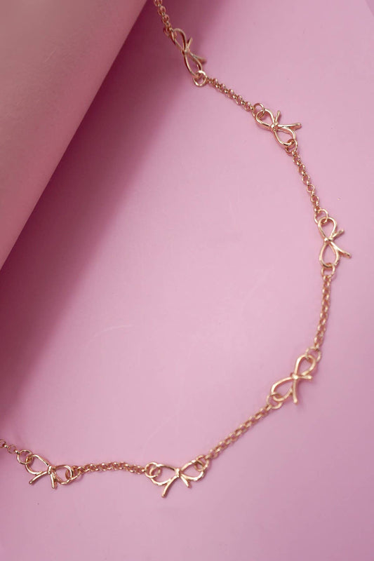 CUTOUT BOW STATION NECKLACE | 80N91531: Gold